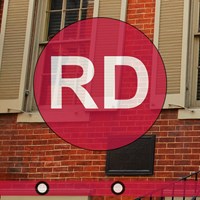 A ranger leads a tour of the Peterson House.