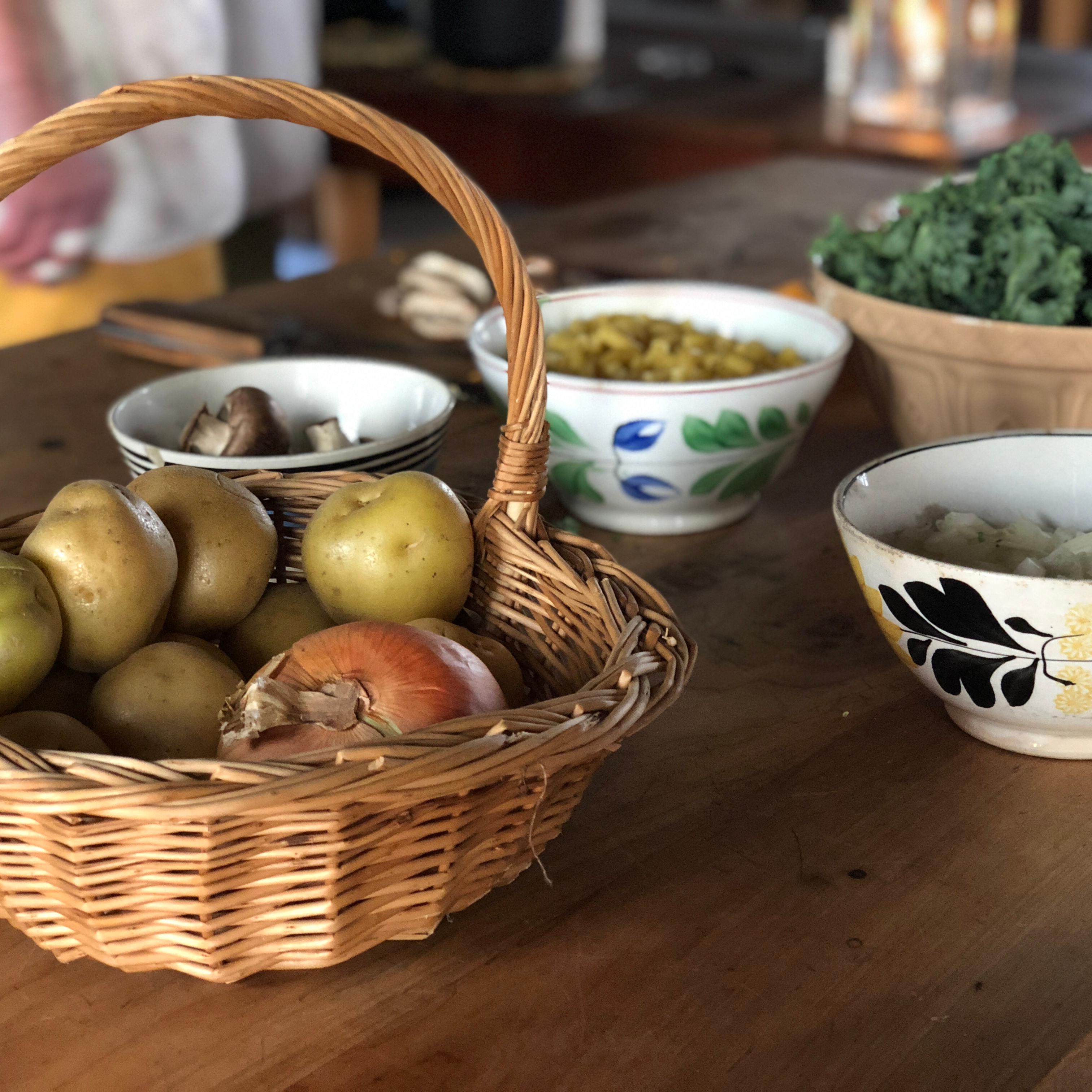 Ingredients in bowls sitting on a table in the Fort Vancouver Kitchen.