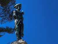outdoors, closeup, statue, man, blue sky