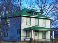 This two-story home in American Foursquare design is the first residence of Bill Clinton.