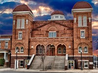 16th St. Baptist Church surrounded by storm clouds.