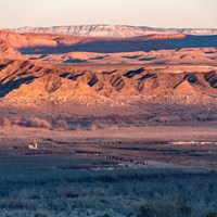 Old historic buildings left in a desert landscape.