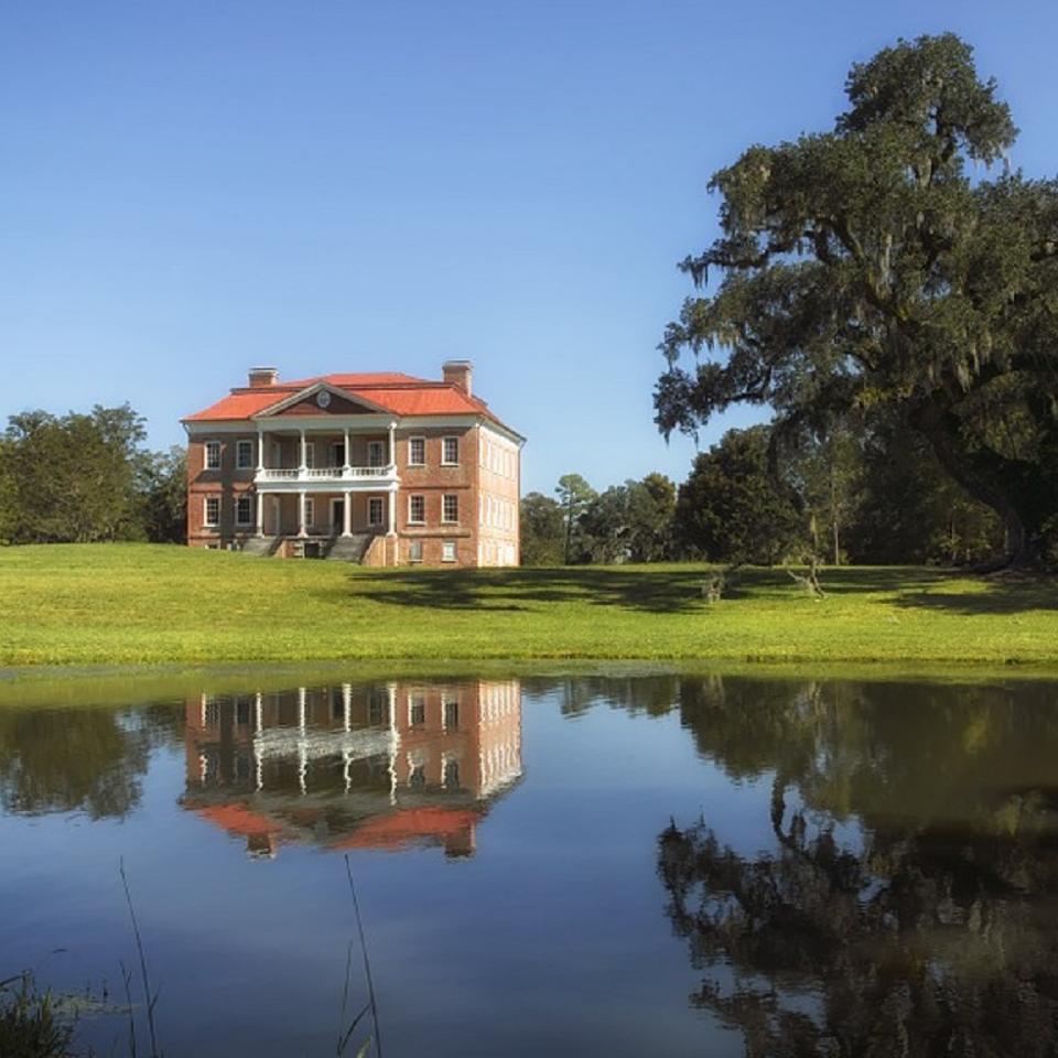 Colored photo of Drayton Hall and grounds. 