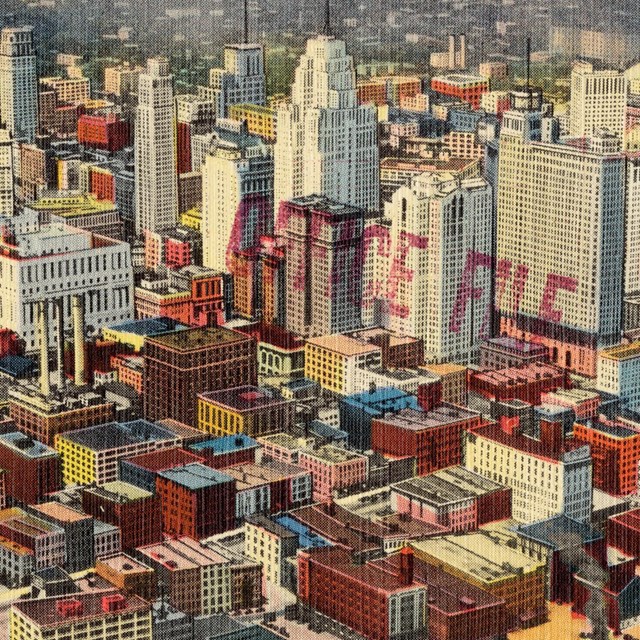 Colorized image of a high angle view over skyscrapers and a downtown city landscape. 
