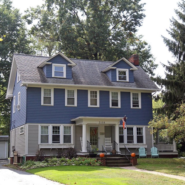 exterior view of blue frame house; property is located in Cleveland Heights, Ohio