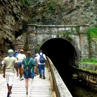 Visitors walk on the Potomac Heritage Trail.