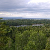 View of a forested island, interior lake, Lake Superior, and Canada.