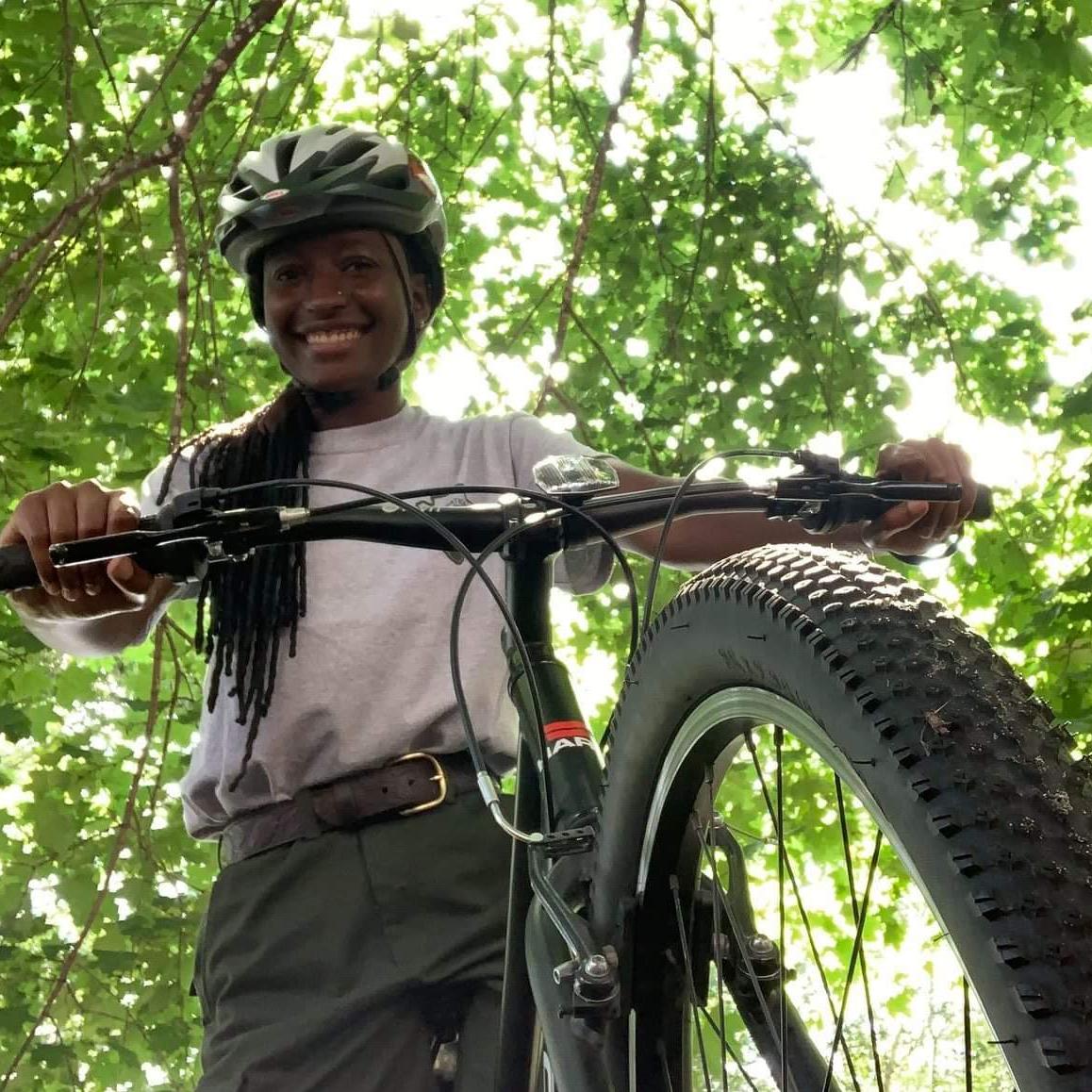A ranger on a bicycle 
