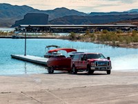 Launch ramp into the lake with a truck and boat.