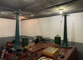 A present-day view inside the Whitney Vault; the tall green items are the Omori Seismometers.