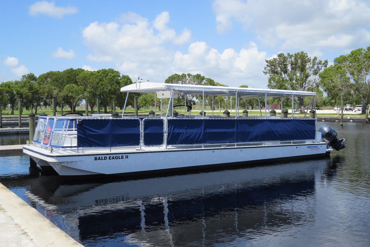 A pontoon boat on water