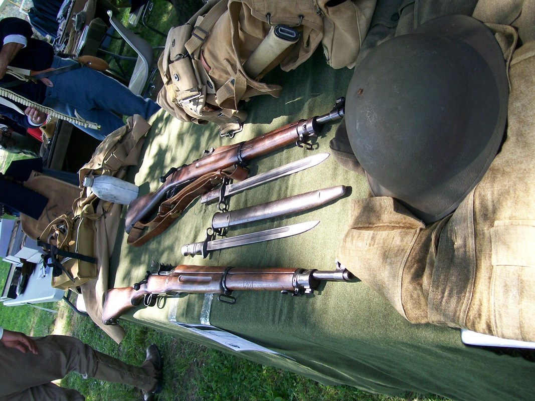 Equipment and weapons from World War Two on a display table