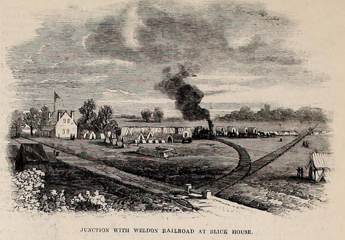 Sketch - Railroad junction in front of multiple rows of tents and wagons and a building on the left.