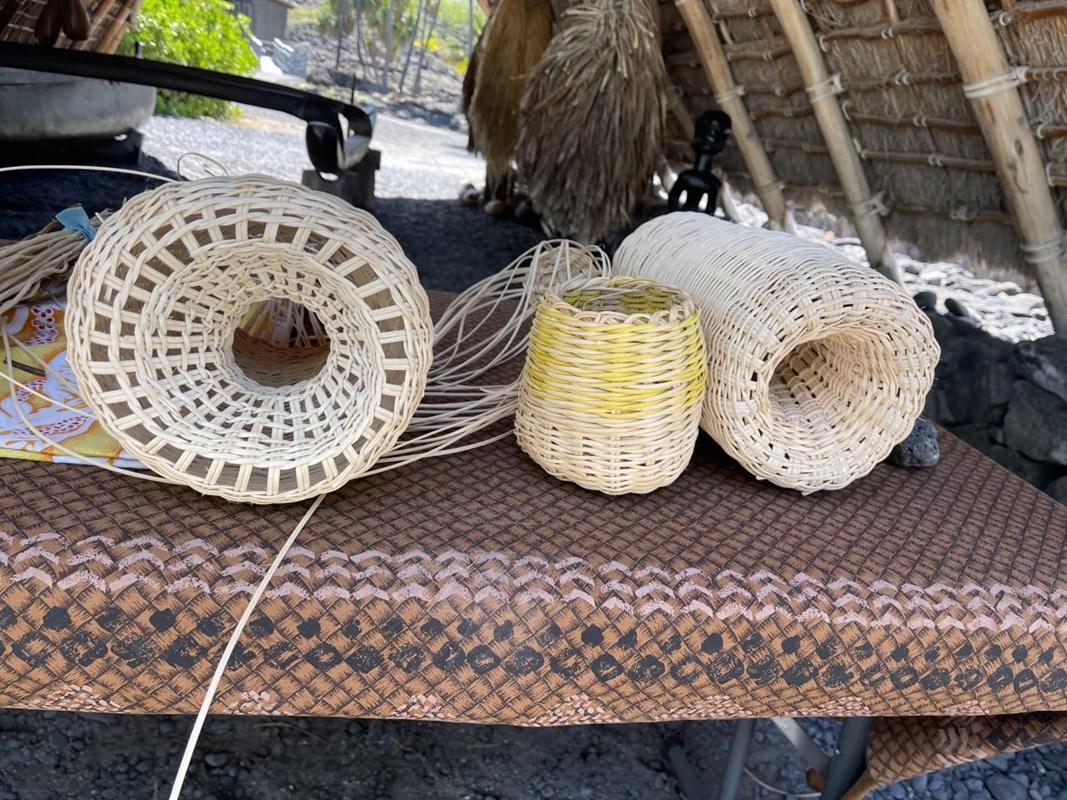 Woven baskets and fish traps of different sizes made from 'ie'ie (Freycinetia arborea)