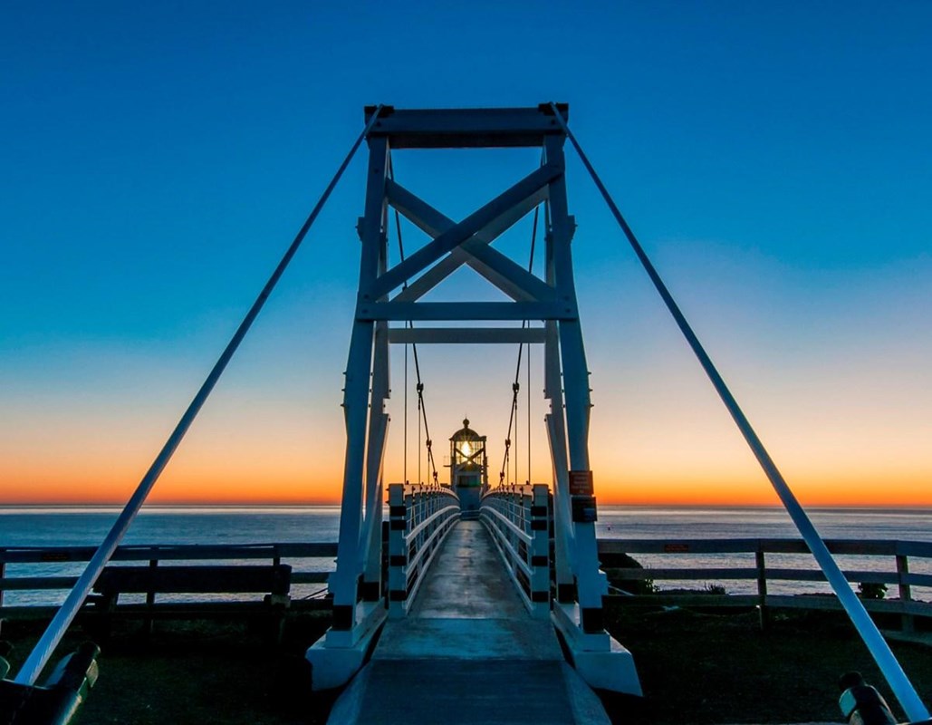 Point Bonita at sunset, accessible via a suspension bridge.