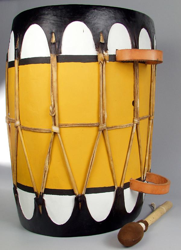 A black, white, and yellow handmade pueblo drum.