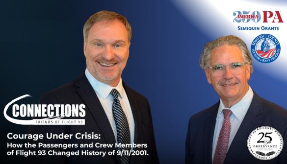 Two men smile in front of a blue background