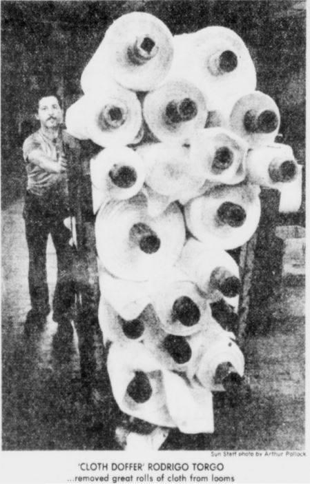 Colombian worker Rodrigo Torgo moves bolts of cloth around the Wannalancit Mill in 1980
