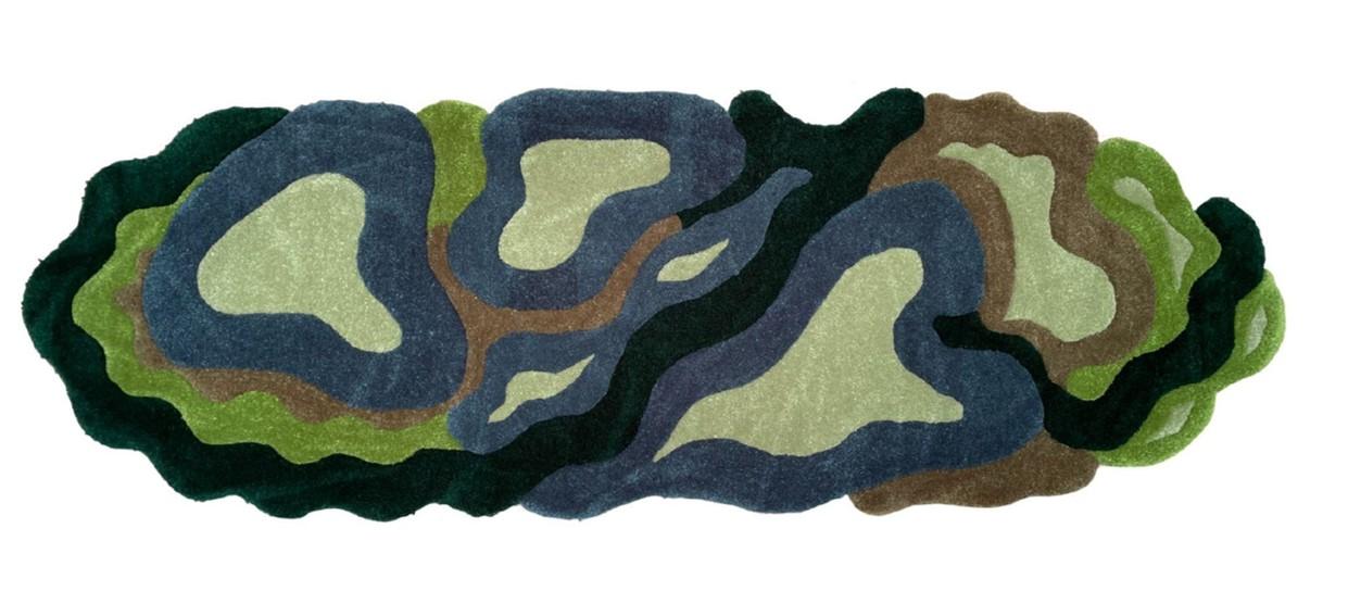 A multi-colored rug resembling an aerial view of a river and streamside vegetation