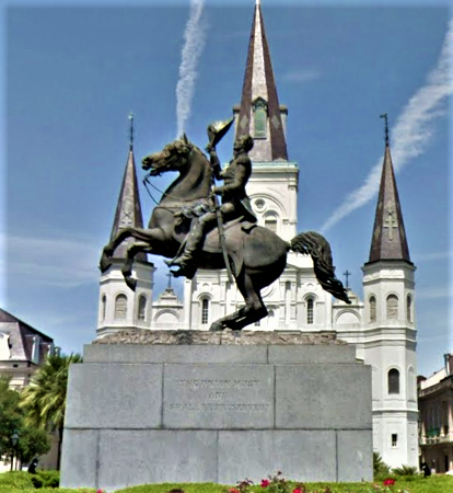 Photo of Andrew Jackson statue in Jackson Square, New Orleans against a blue sky.