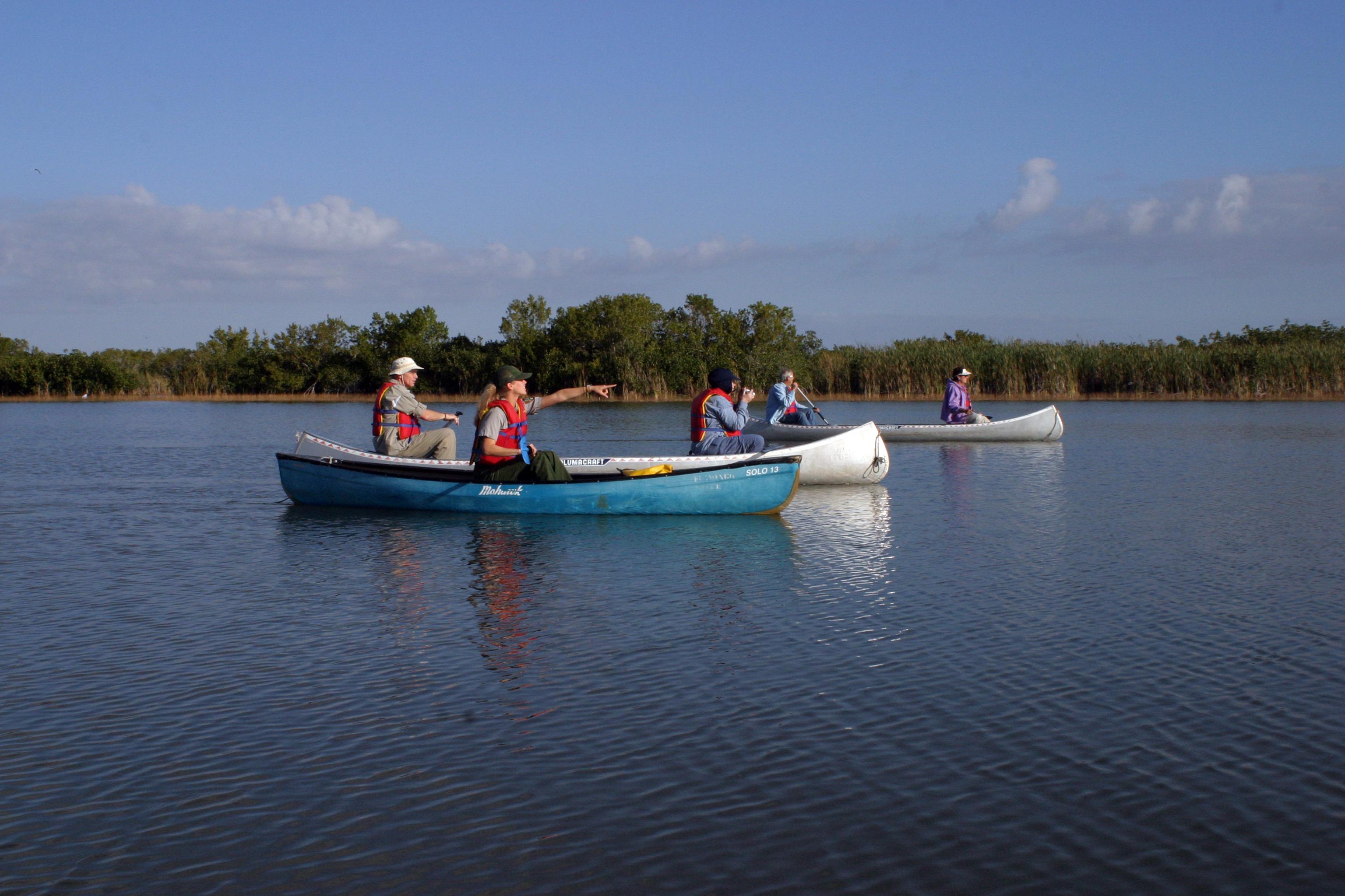 Ranger leading a canoe trip with visitors