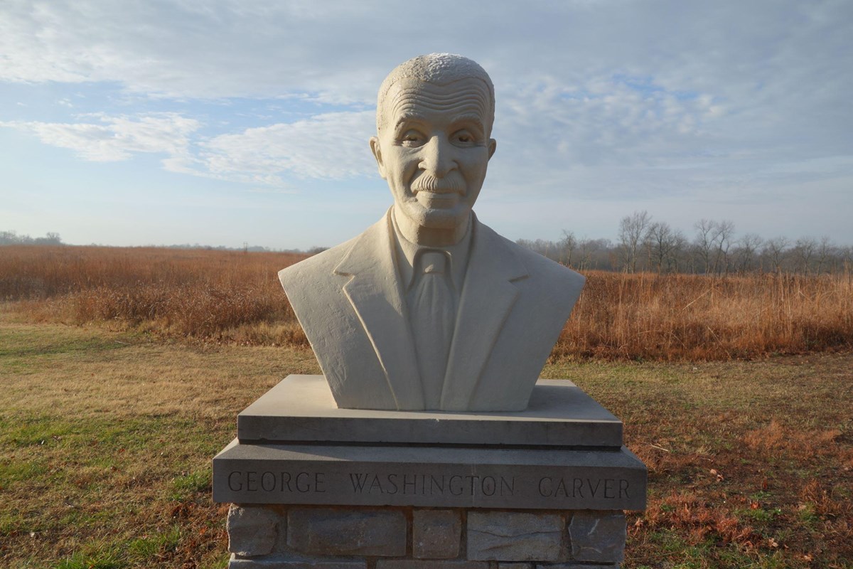 Cast concrete bust of George Washington Carver