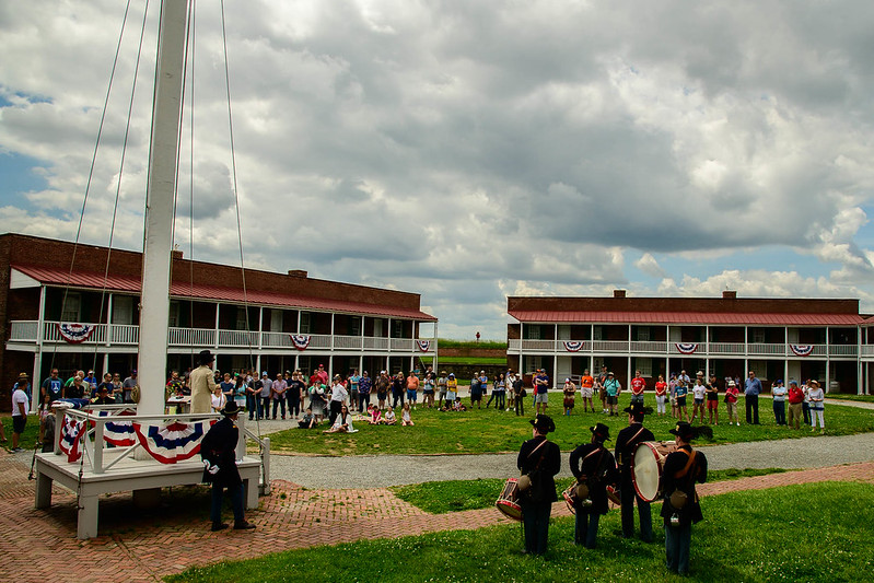 A view of a memorial day program happening within the star fort.