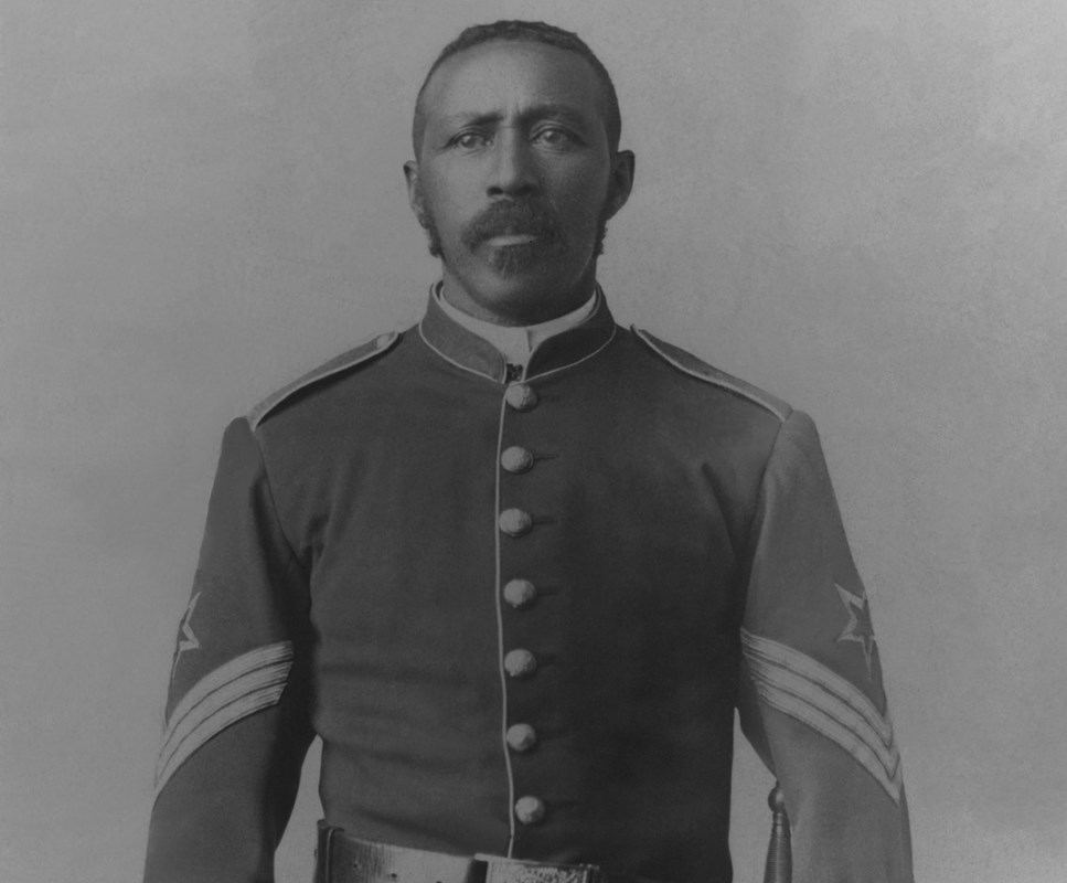 Man wearing 19th century Army uniform.