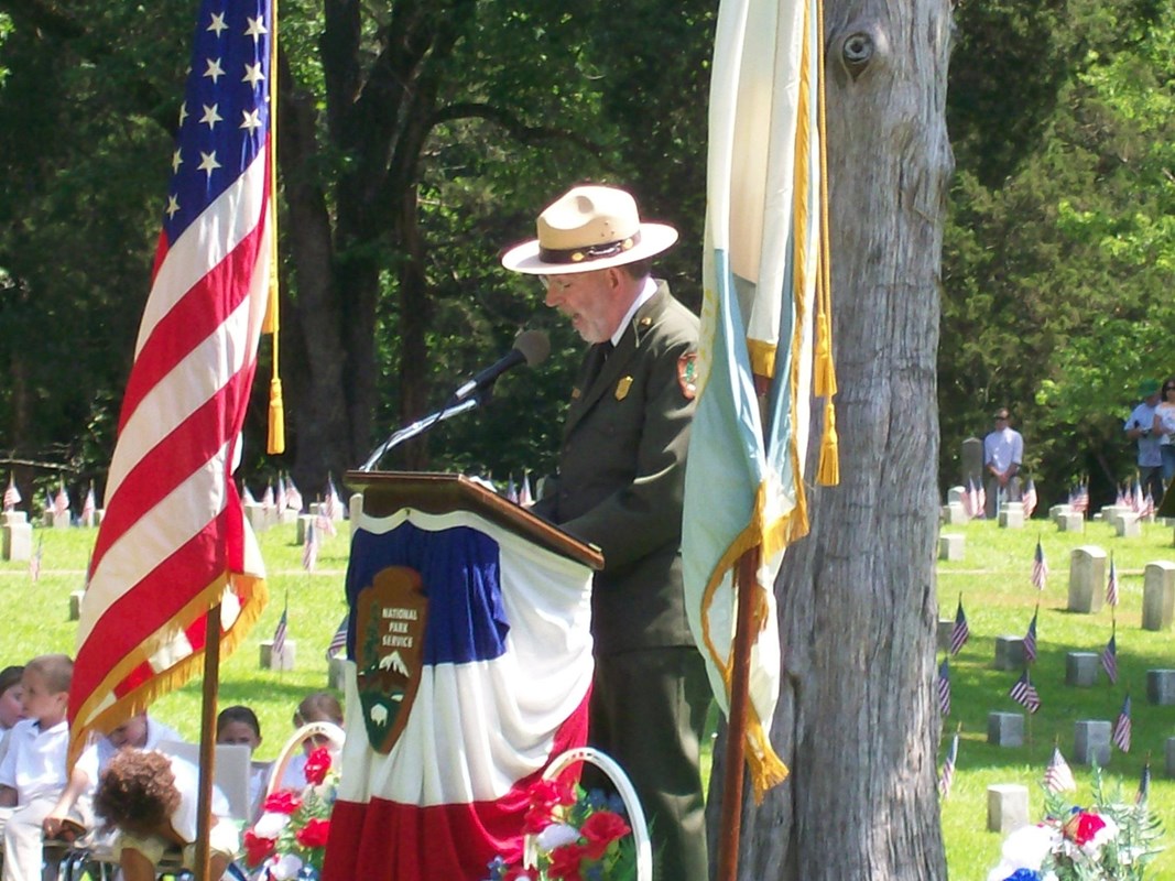 Man in ranger uniform giving a speech.