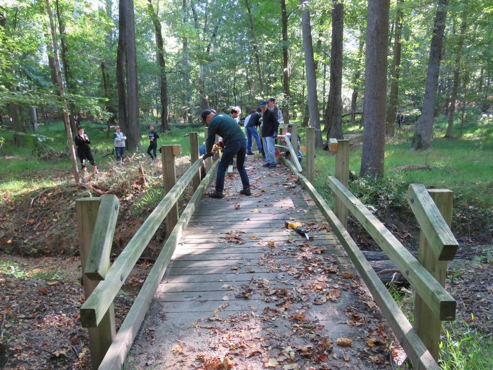 National Park Service Volunteers repairing a bridge on the perimeter trail.