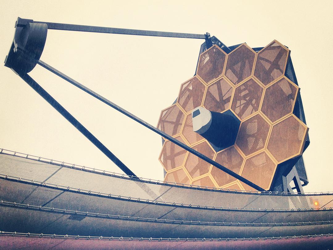an array of honeycomb-shaped panels around an antenna