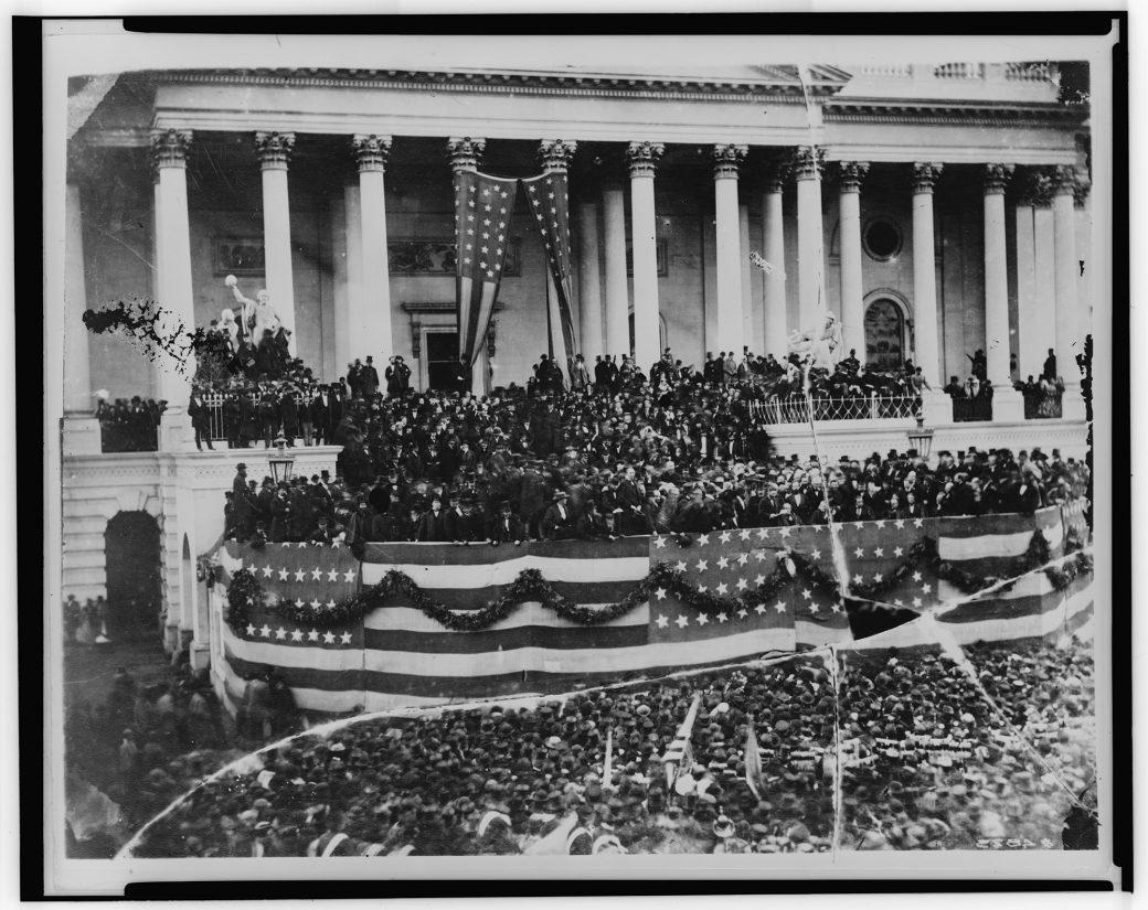 Black and white photograph of President Grant surrounded by a large crowd at the U.S. capitol.