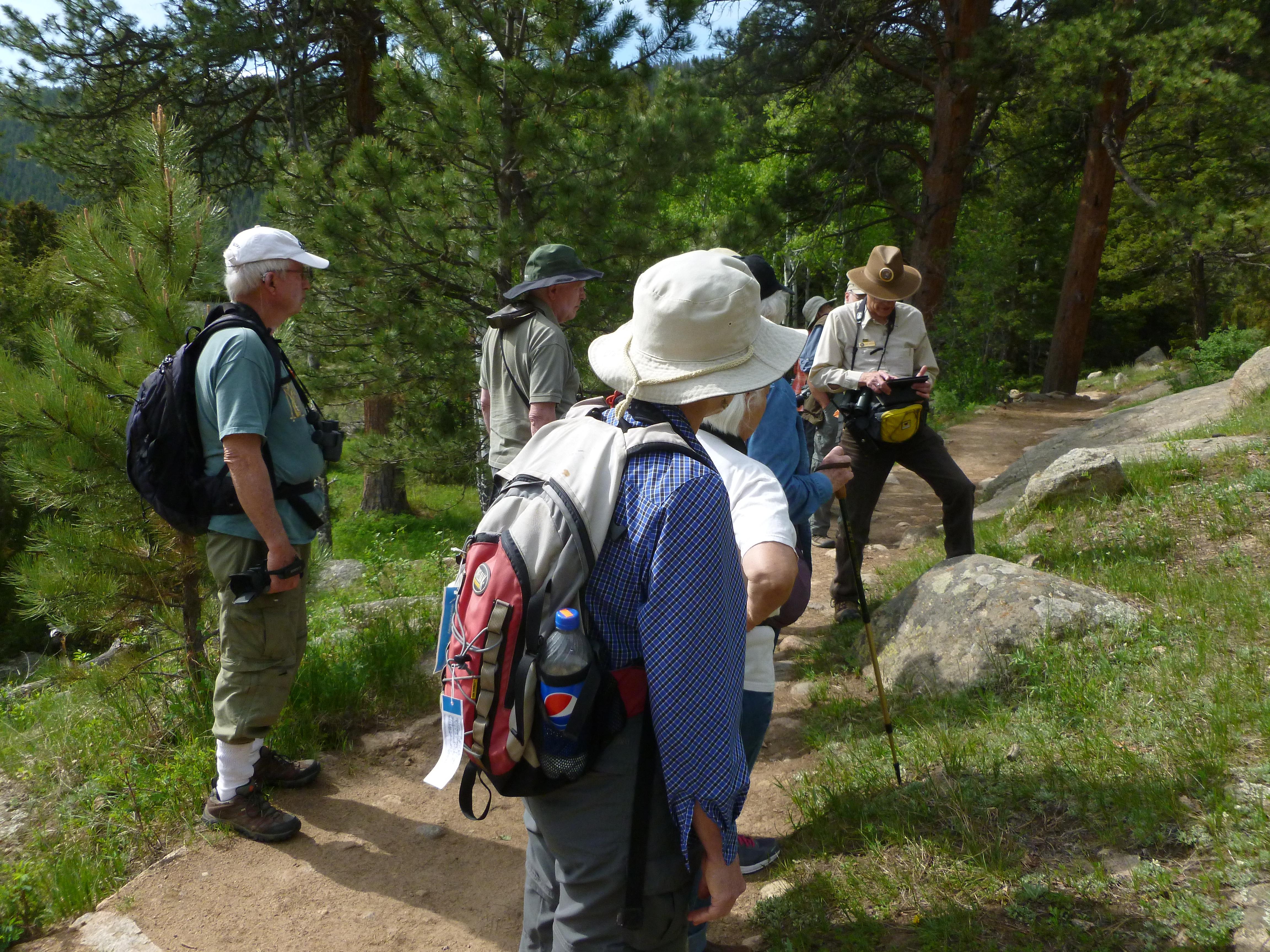 Park visitors are on a guided bird walk