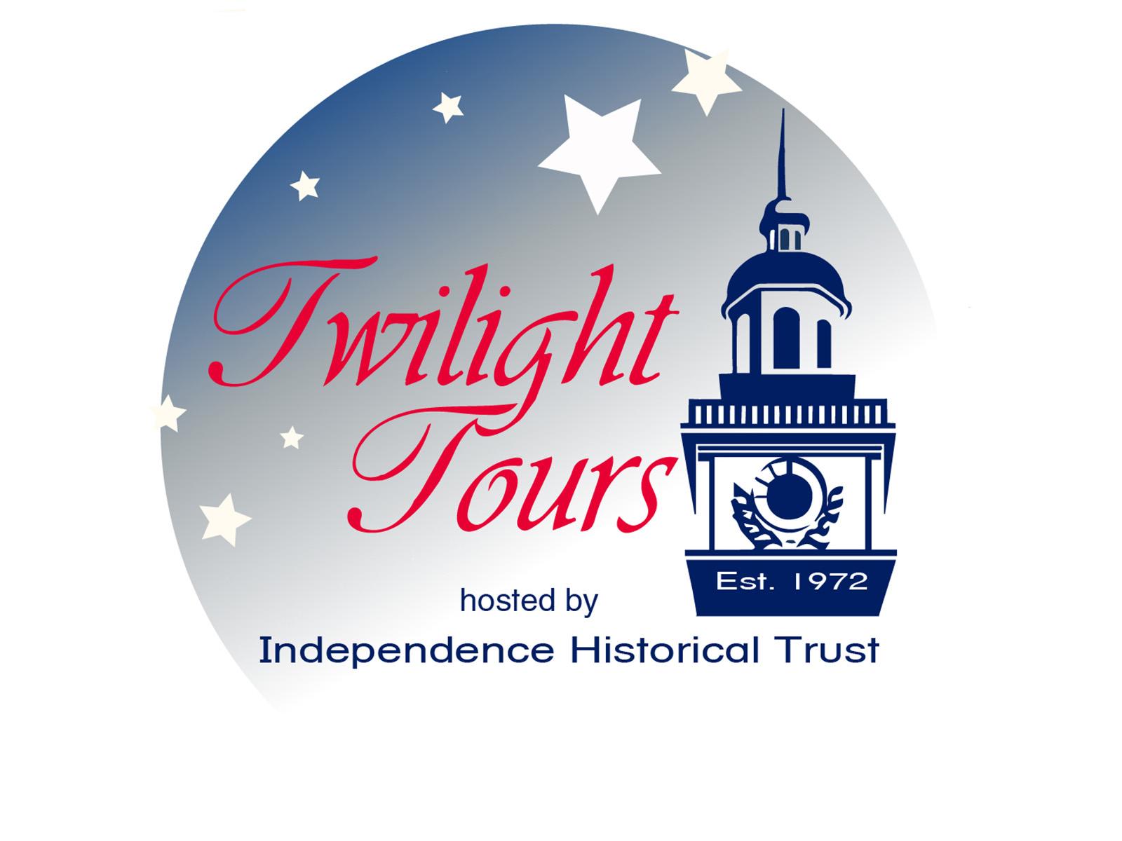Blue stenciled bell tower with the word "Twilight Tours" in red next to it.
