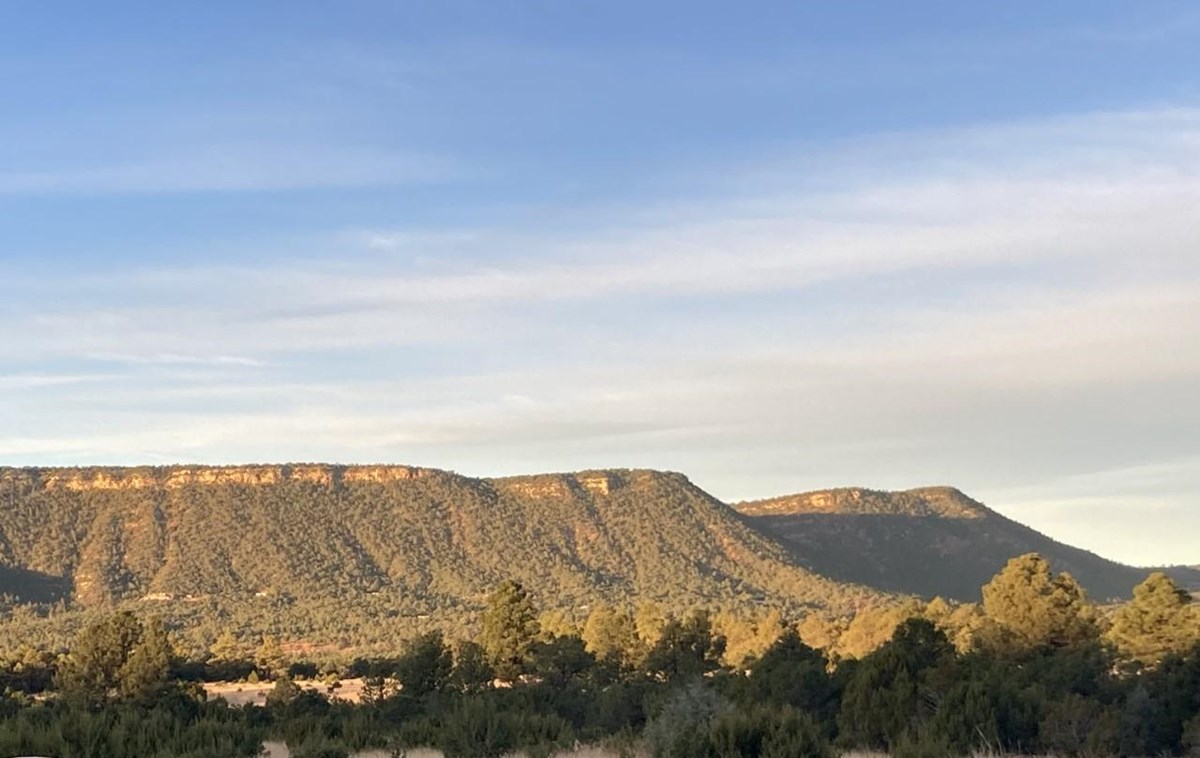 A flat-topped mesa in the morning sun.