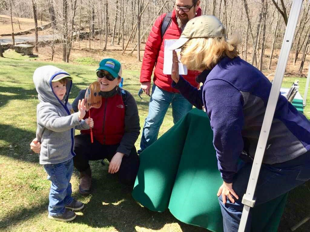 members of the Friends of Weir Farm with a Junior Ranger