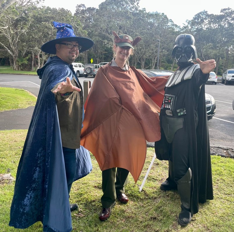 Three rangers dressed as a wizard, bat, and Darth Vader.