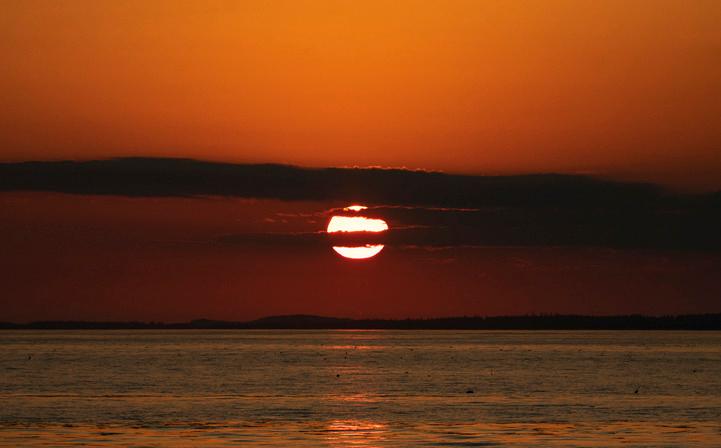 Sunset over the water.