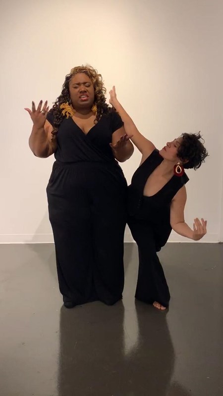 San Antonio Poet Laureate Andrea and dance artist Amber pose together wearing black.