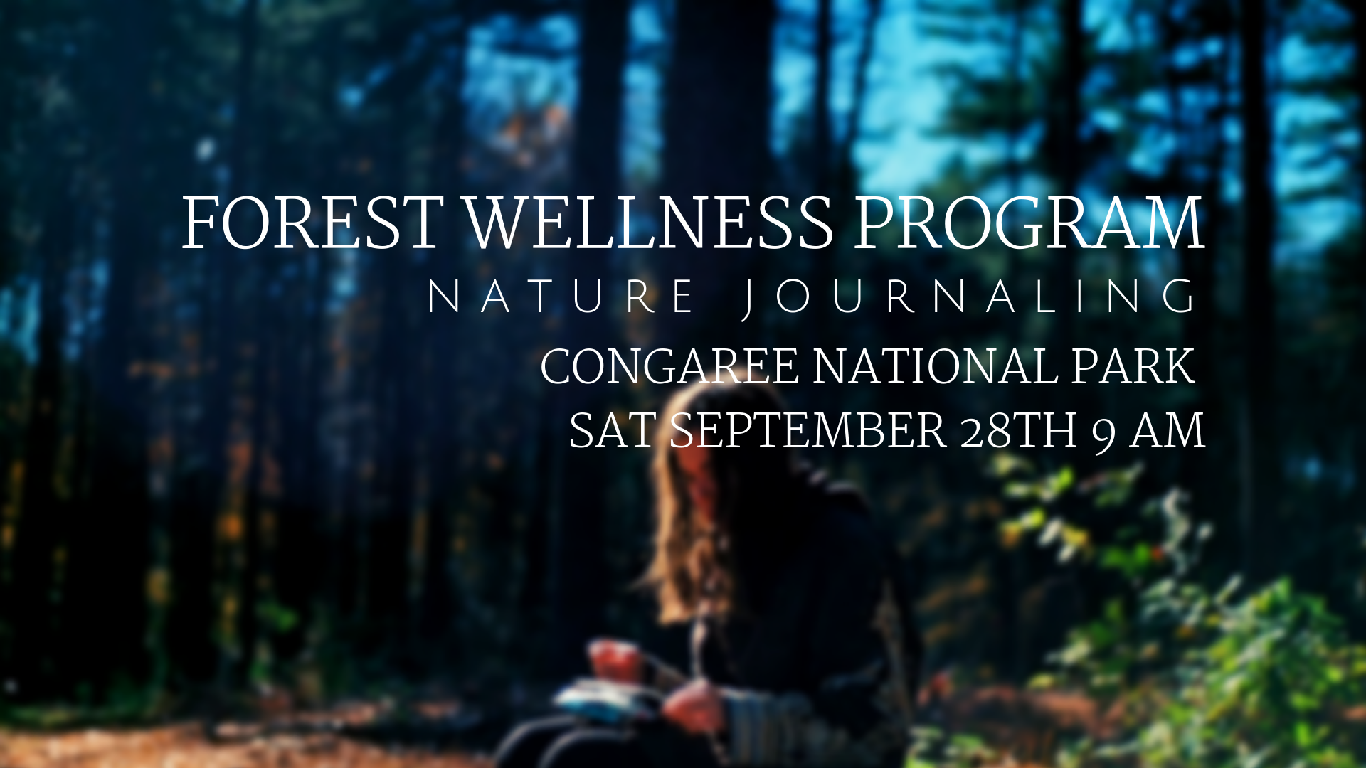 Photo of a young woman writing in a journal while sitting in a forest.