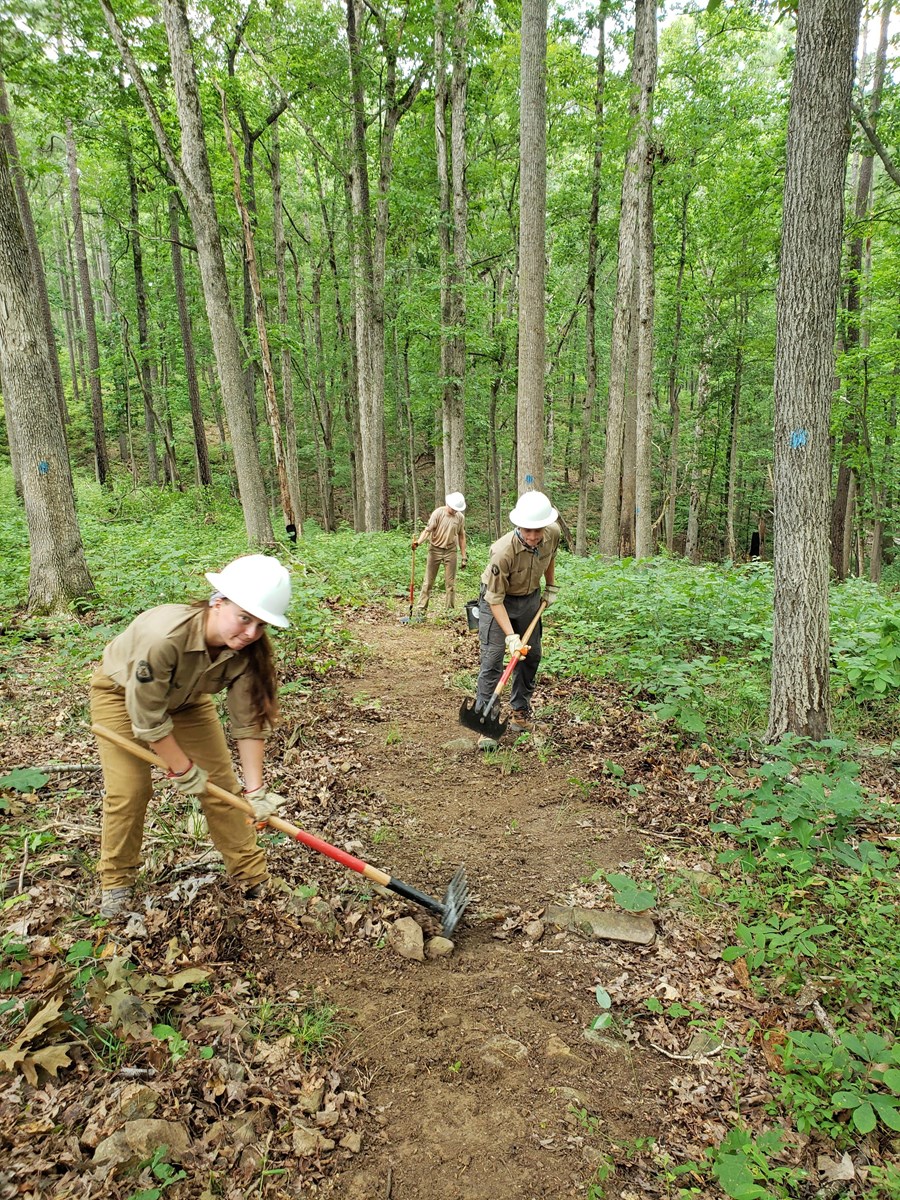 trail crew members constructing a trail