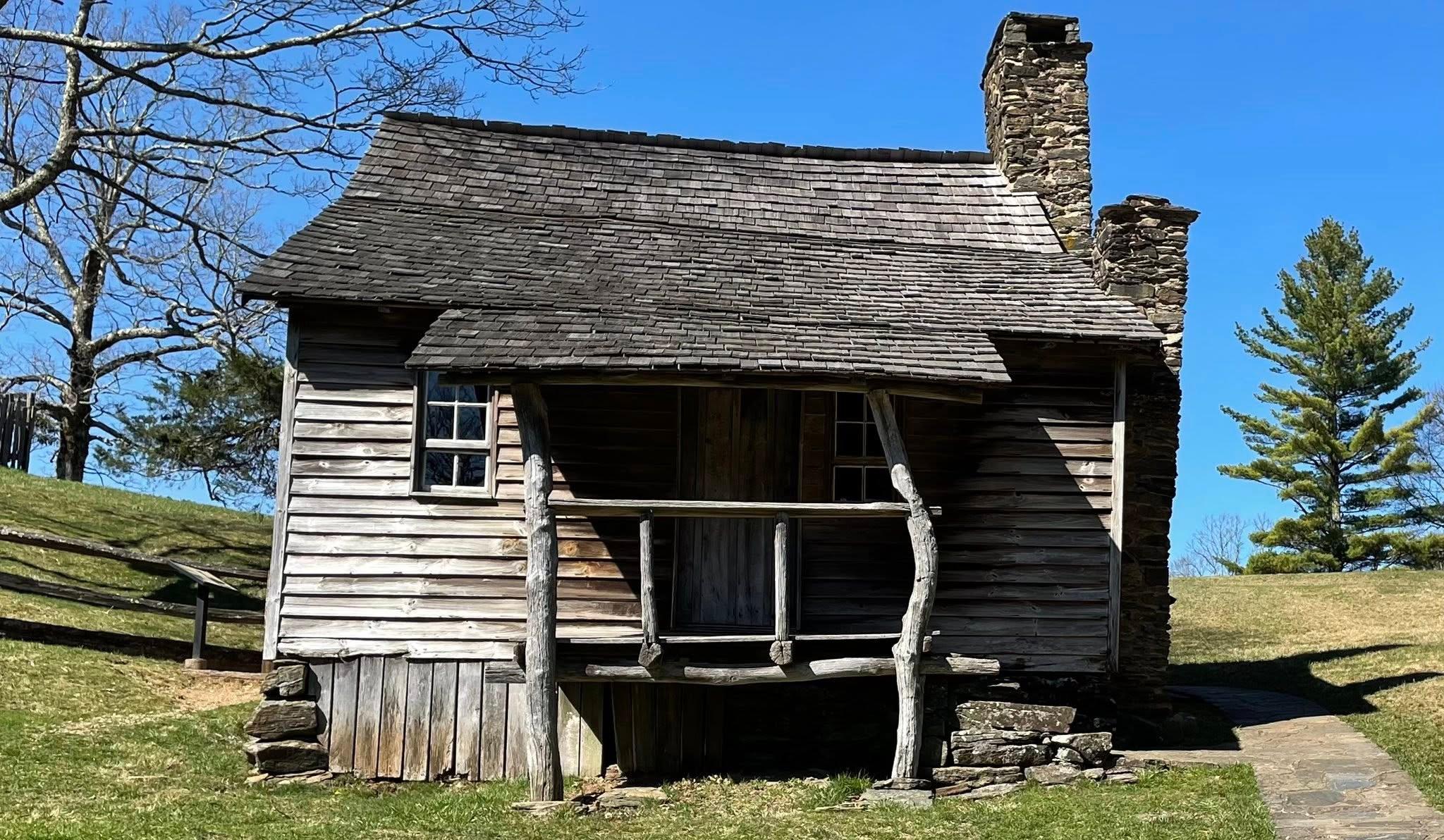 Brinegar Cabin casts a shade on a sunny day
