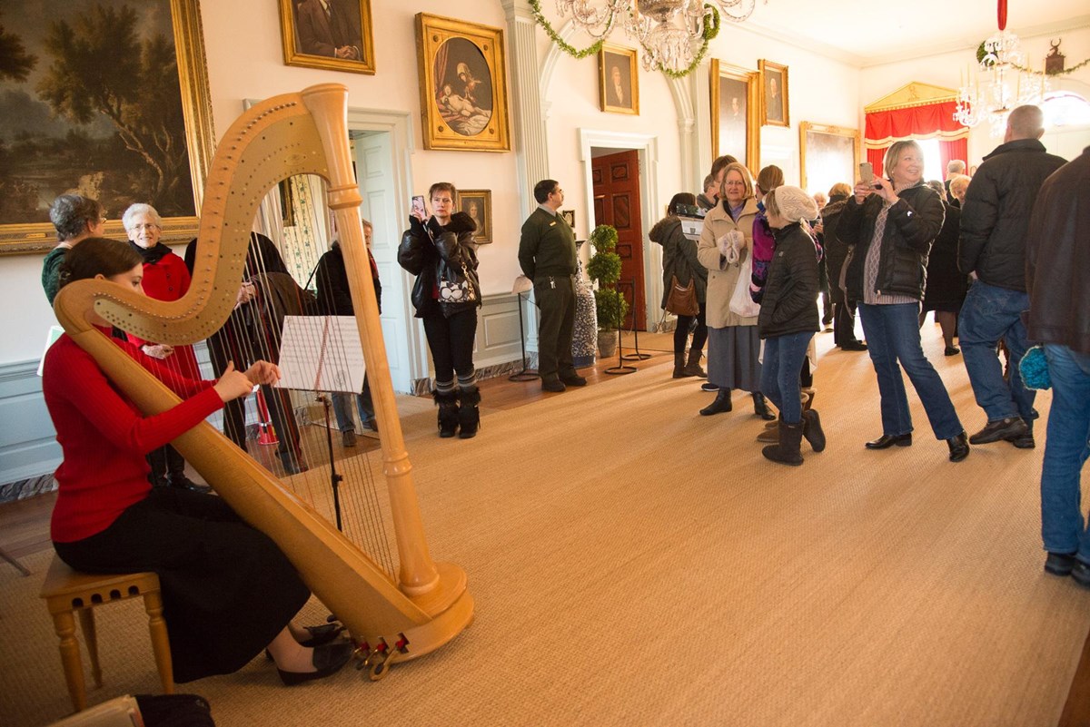 Harpist in mansion Great Hall