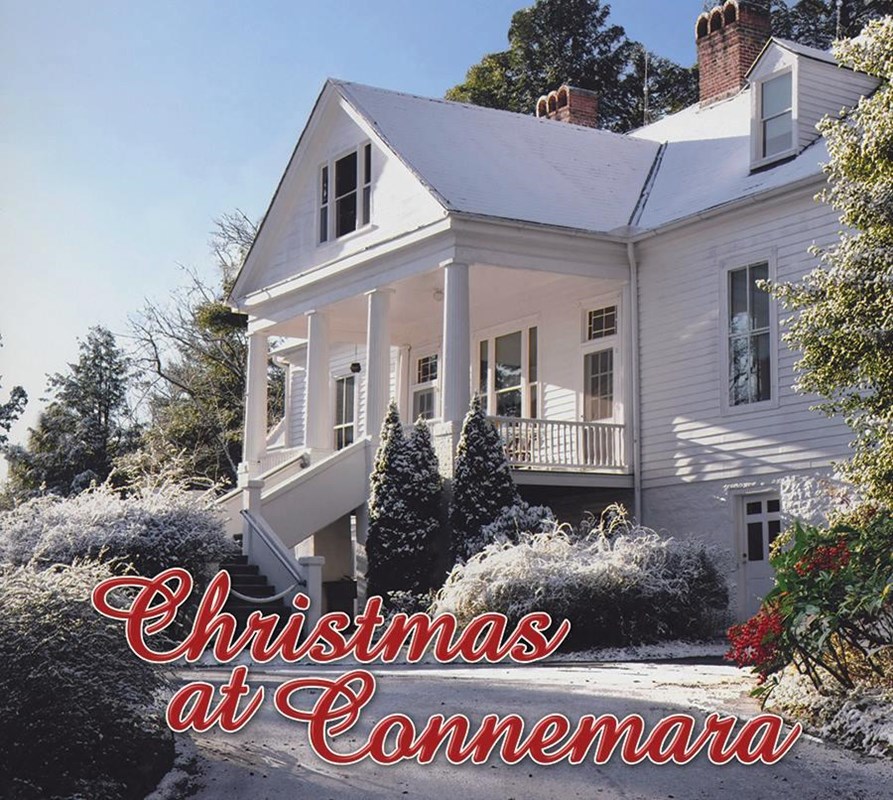 Image of Sandburg Home in the snow with words Christmas at Connemara in red cursive font.