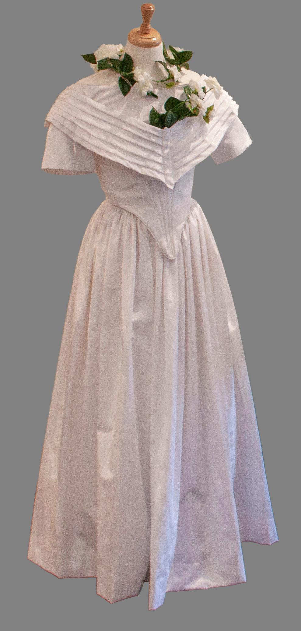 White wedding dress against a gray background