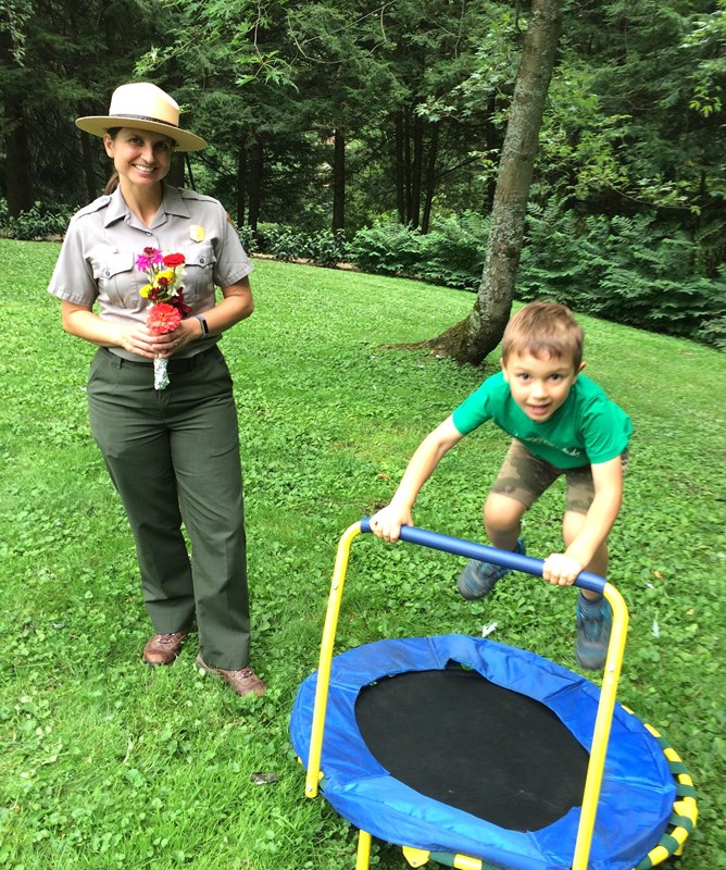 Ranger and her son enjoying some lawn games