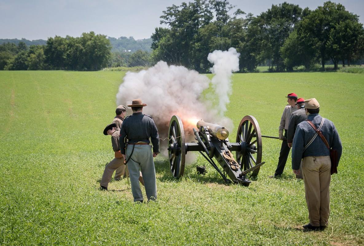 Confederate artillery firing a 12-pounder Napoleon Field Gun