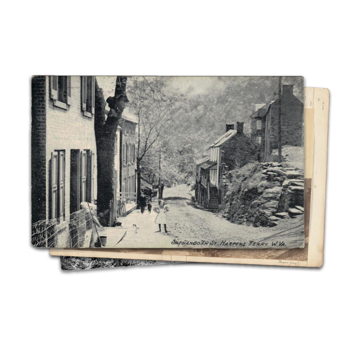 Three historic photos in a stack. The photo on the top has a little child standing in town.
