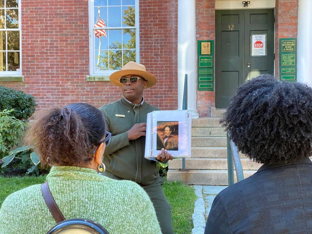 Ranger Rufai giving a walking tour to park visitors