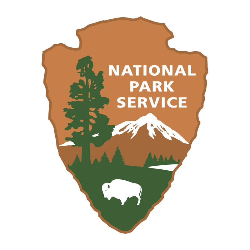 Arrowhead symbol for the National Park Service.